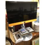 A 40INCH LOEWE CONNECT ID T.V WITH STAND AND LOEWE BLUTECHVISION, BLUE RAY/DVD PLAYER ALL W/O