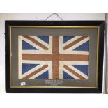 A FRAMED HANDKERCHIEF USED AS A FLAG BY THE LATE COL.C.W. CARRINGTON RMLI IN THE CRIMEA AND IN CHINA