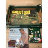 A BOX OF GOLF RELATED ITEMS INCLUDING AN INDOOR CARPET GOLF (UNCHECKED), AN INSTRUCTION MANUAL AND