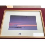 A FRAMED AND GLAZED PHOTOGRAPH BY NATHAN PIDD OF THE YORKSHIRE COASTLINE