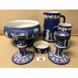 A QUANTITY OF WEDGEWOOD BLUE JASPERWARE INCLUDES A PAIR OF CANDLESTICKS