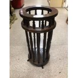 A VINATGE ROUND WOODEN STICKSTAND 53 X 26CM