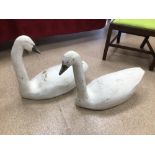 TWO LARGE MALE AND FEMALE WOODEN MODELS OF SWANS