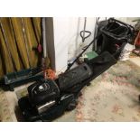 A BRIGGS AND STRATTON (HARRIER) PETROL LAWNMOWER