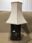 A BLACK LACQUERED CHINOISERIE TABLE LAMP