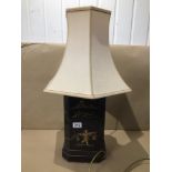 A BLACK LACQUERED CHINOISERIE TABLE LAMP