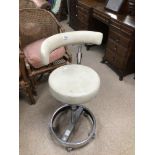 AN ADJUSTABLE ANTHAS IMOLA DENTIST STOOL ON CASTORS IN CHROME