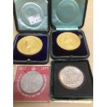 FOUR BOXED COINS INCLUDES A PAIR OF COPPER CALCUTTA INTERNATIONAL EXHIBITION DATED 1883-1884 AND