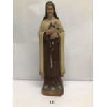 A VINTAGE FRENCH CHALK SAINT THERESE RELIGIOUS FIGURINE APPROX 44CM HIGH