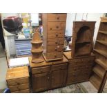 TEN PIECES OF GOLDEN PINE FURNITURE INCLUDING CHEST OF DRAWERS AND BOOKCASE AND MORE