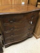 A MAHOGANY SERPENTINE FRONTED FOUR DRAWER CHEST