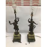 A PAIR OF VINTAGE BRONZED SPELTER FIGURAL TABLE LAMPS OF WOMEN WITH GREEN MARBLE BASE A/F TALLEST IS