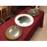 THREE ROUND VINTAGE MIRRORS TWO BEING CONVEX