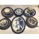 A LARGE COLLECTION OF VINTAGE BOOTHS 'REAL OLD WILLOW' PATTERN GILDED PLATEWARE, THE LARGEST PLATE