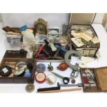 A LARGE QUANTITY OF WATCH MAKERS TOOLS, SCREWS AND MORE