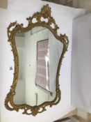 A 20TH CENTURY GOLD GILDED WALL MIRROR