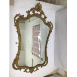 A 20TH CENTURY GOLD GILDED WALL MIRROR