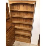 A SIX TIER PINE BOOKCASE