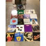 A COLLECTION OF VINYL RECORDS INCLUDING FOCUS, ZZ TOP, NEIL DIAMOND, FLEETWOOD MAC, AND MORE