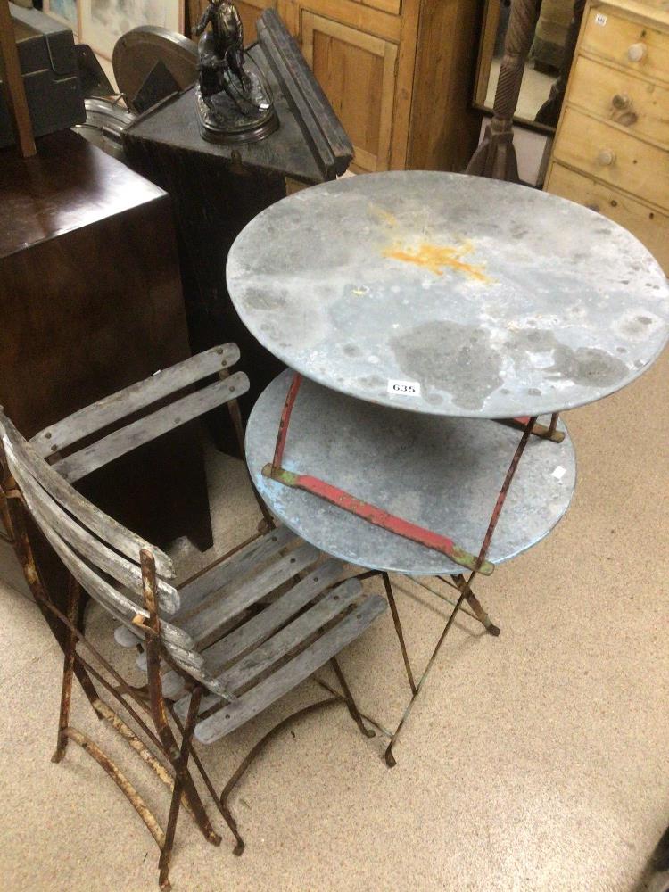 A FOLDING METAL GARDEN TABLE WITH TWO CHAIRS AND SIDE TABLE