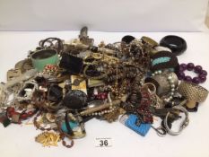 A BOX OF COSTUME JEWELLERY