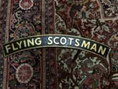 A VINTAGE CAST IRON 'FLYING SCOTSMAN' RAILWAY SIGN APPROX 90 X 11CM