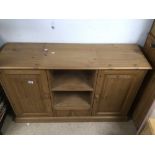 A VINTAGE PINE KITCHEN UNIT WITH STORAGE