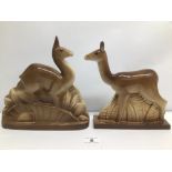 A PAIR OF ART DECO PORCELAIN OF DEERS WITH MARKINGS TO THE BASE 'GEO CONDE' ON ONE OF THEM,