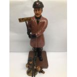 TWO VINTAGE REPRODUCTION FIGURES TOGETHER WITH A VINTAGE BOTTLE STOPPER TALLEST IS APPROX 54CM