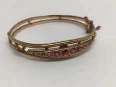 A HM 9CT ROSE GOLD BANGLE SET W/PINK TOURMALINES & DIAMOND CHIPS (TWO MISSING) ONE STONE REPLACED