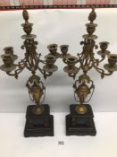 A PAIR OF FRENCH GILT METAL AND MARBLE FIVE BRANCH CANDELABRAS 58CM HIGH