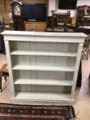 A VINTAGE PAINTED PINE BOOKCASE