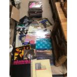 A LARGE VINTAGE COLLECTION OF VINYL RECORDS INCLUDING SUPERTRAMP, A-HA, LITTLE RICHARD, AND MANY