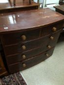 A BOW FRONTED TWO OVER THREE CHEST OF DRAWERS
