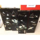 FOUR VINTAGE ORIENTAL LACQUER PANELS WITH SYNTHETIC DECORATIONS OF CRANES AND FLOWERS WITH MOTHER OF