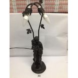 A RESIN FIGURAL TABLE LAMP OF A MAN AND A WOMAN WITH WOODEN BASE APPROX 66CM HIGH