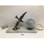 AN ART DECO LAMP ON MARBLE BASE WITH A METAL FLYING BIRD