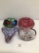 A SET OF FOUR GLASS PAPERWEIGHTS UNMARKED BIGGEST 16CM