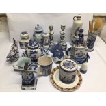 A MIXED COLLECTION OF VINTAGE BLUE AND WHITE SOME DELFT PORCELAIN WARE INCLUDING CANDLESTICKS POTS