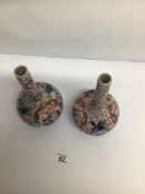 A PAIR OF EARLY 20TH CENTURY JAPANESE IMARI VASES, 26CM TALL