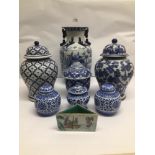 A COLLECTION OF BLUE AND WHITE CHINESE ITEMS INCLUDING A LARGE VASE, A SMALL UNIQUE DISH, AND MORE