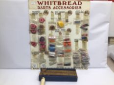 A VINTAGE 'BRIGHTON AND HOVE ALBION' FOOTBALL RATTLE AND WHITBREAD DARTS ACCESSORIES