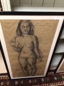 A FRAMED AND GLAZED CHARCOAL DRAWING OF A NUDE LADY APPROX 62CM X 110CM