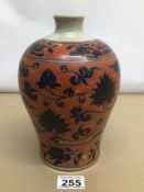 A KANGXI CHINESE BALUSTER VASE WITH IRON RED AND BLUE DECORATION SIX CHARACTER MARKS TO BASE 24CM