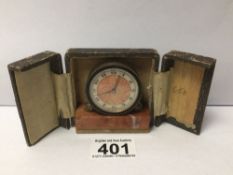 A 19TH CENTURY CASED TRAVEL CLOCK ON A PINK MARBLE BASE (MISSING WINDER) 6.5 X 6.5CM