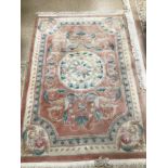A VINTAGE CHINESE RUG, 190 X 124CM
