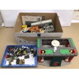 A LARGE COLLECTION OF VINTAGE MICRO MACHINES AND TOYS FROM THE 1980S AND LATER. INCLUDES MATCHBOX,