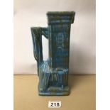 A VINTAGE BLUE CERAMIC GIBSONS JUG (TURKISH), 27CM HIGH