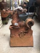 A VICTORIAN TERRACOTTA RIDGE TILE WITH A TWIN HEADED DRAGON A/F