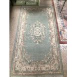 A VINTAGE PERSIAN WOOL RUG, 186 X 94CM